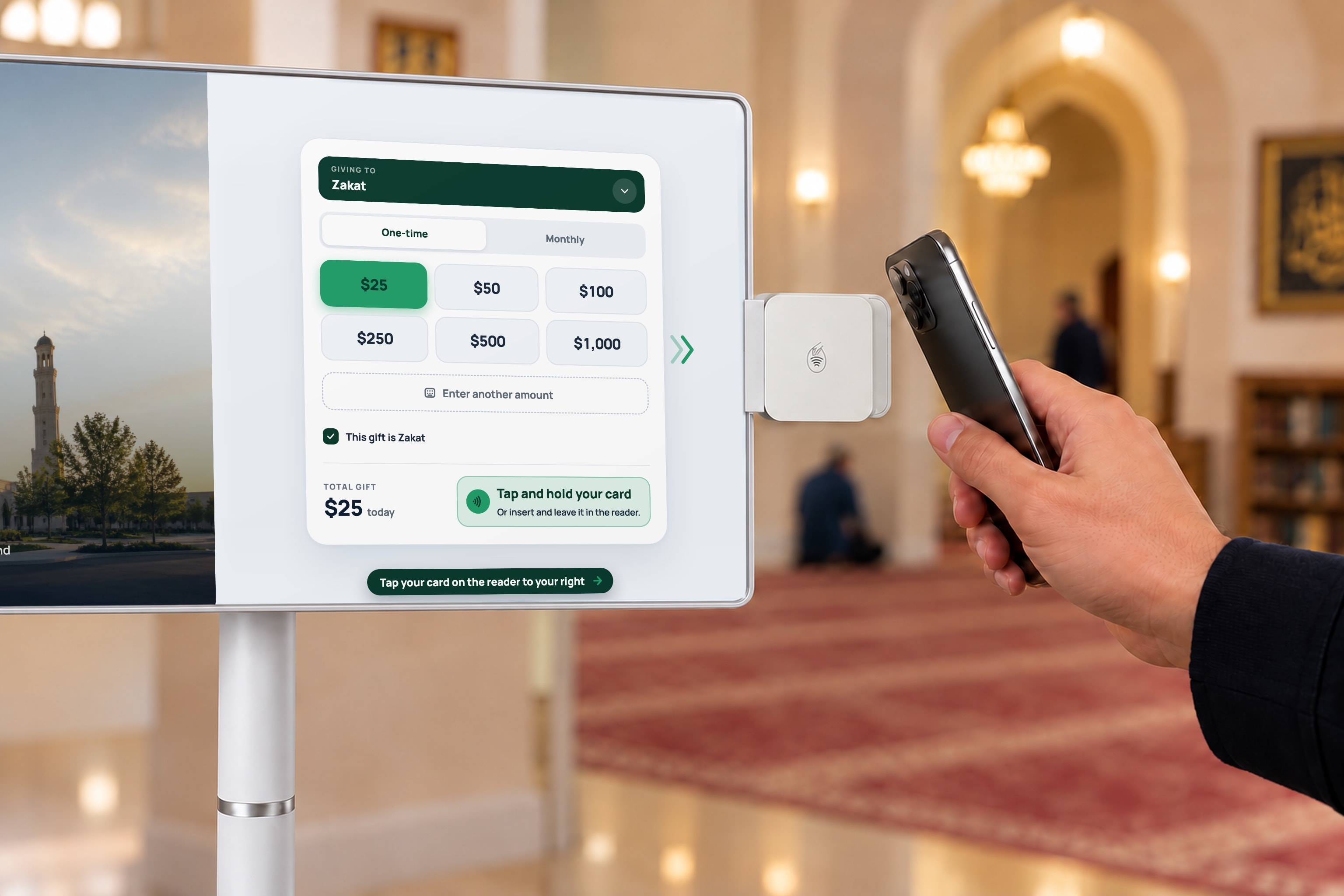 A donor taps a phone on the card reader beside the giving screen